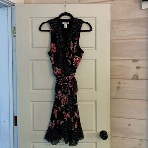Ladies Dress size Medium. Brand is White House Black Market. Like new!!